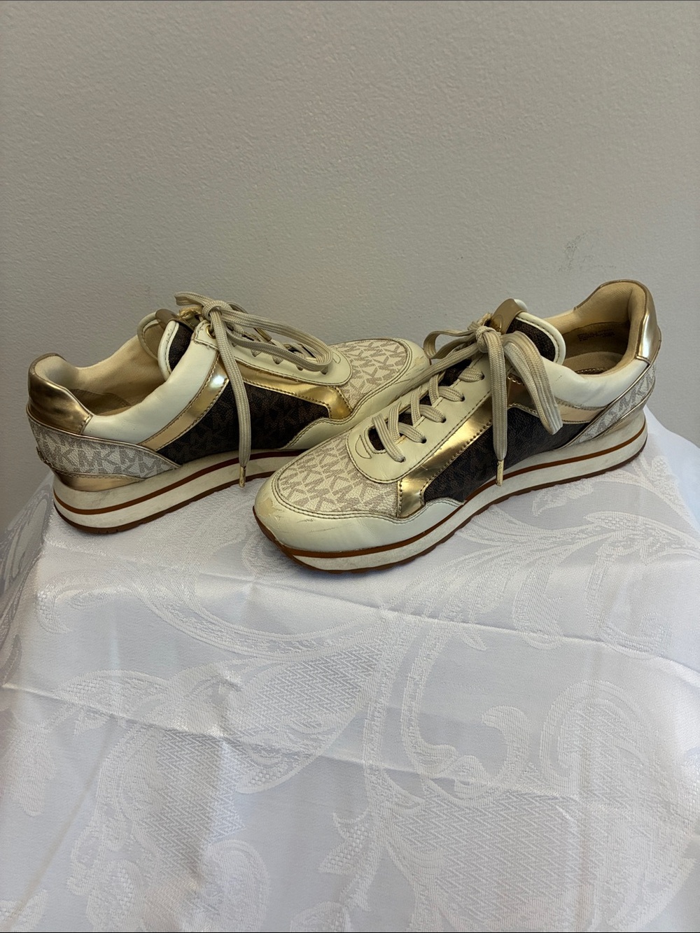 Michael Kors Cream and Gold Logo Low-Top Sneakers
